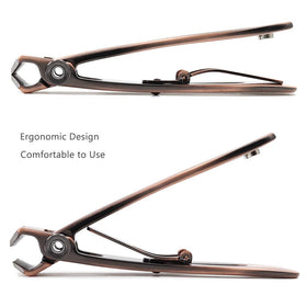 Coupe-ongles SZQHT posé sur une surface neutre