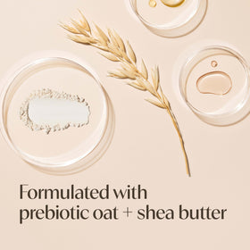 Crème hydratante Aveeno sur une table avec des plantes