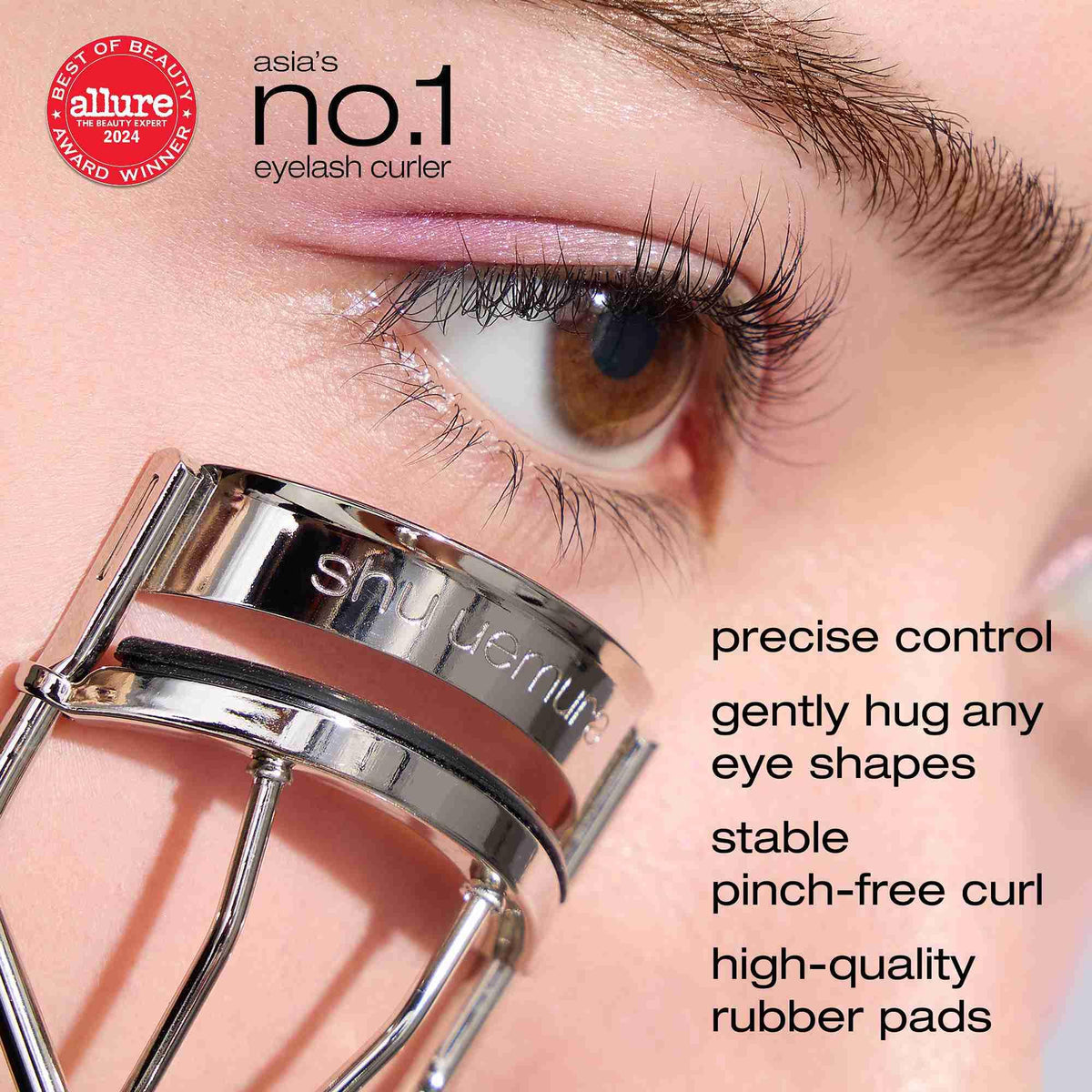 Curleur à cils shu uemura avec un coussin de remplacement en silicone
