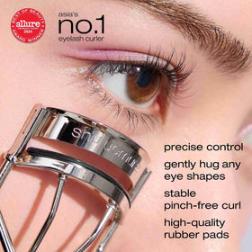 Curleur à cils shu uemura avec un coussin de remplacement en silicone