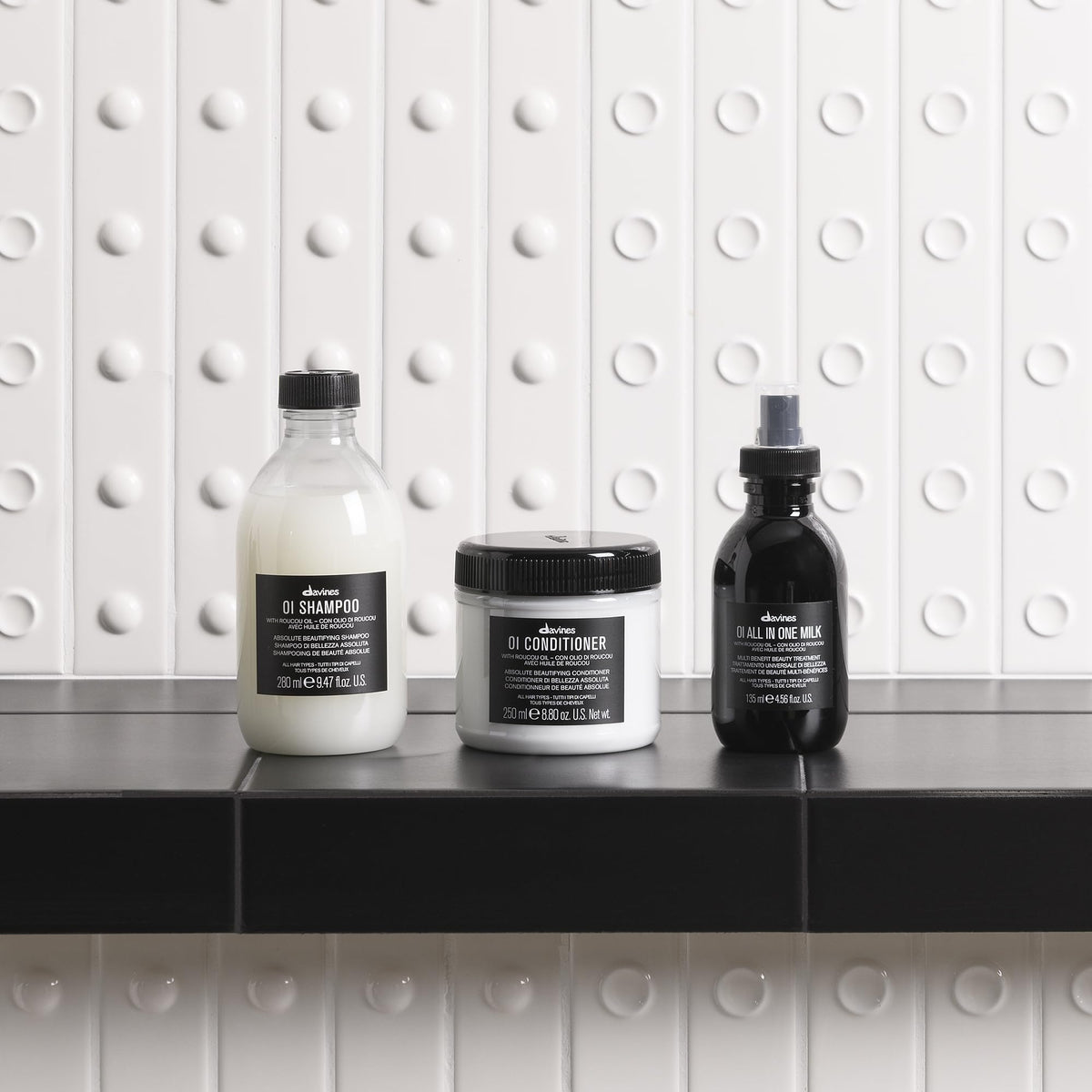 Davines OI Shampoo 330g avec flacon ouvert