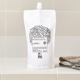 Davines shampooing recharge 500ml, en situation sur un lavabo