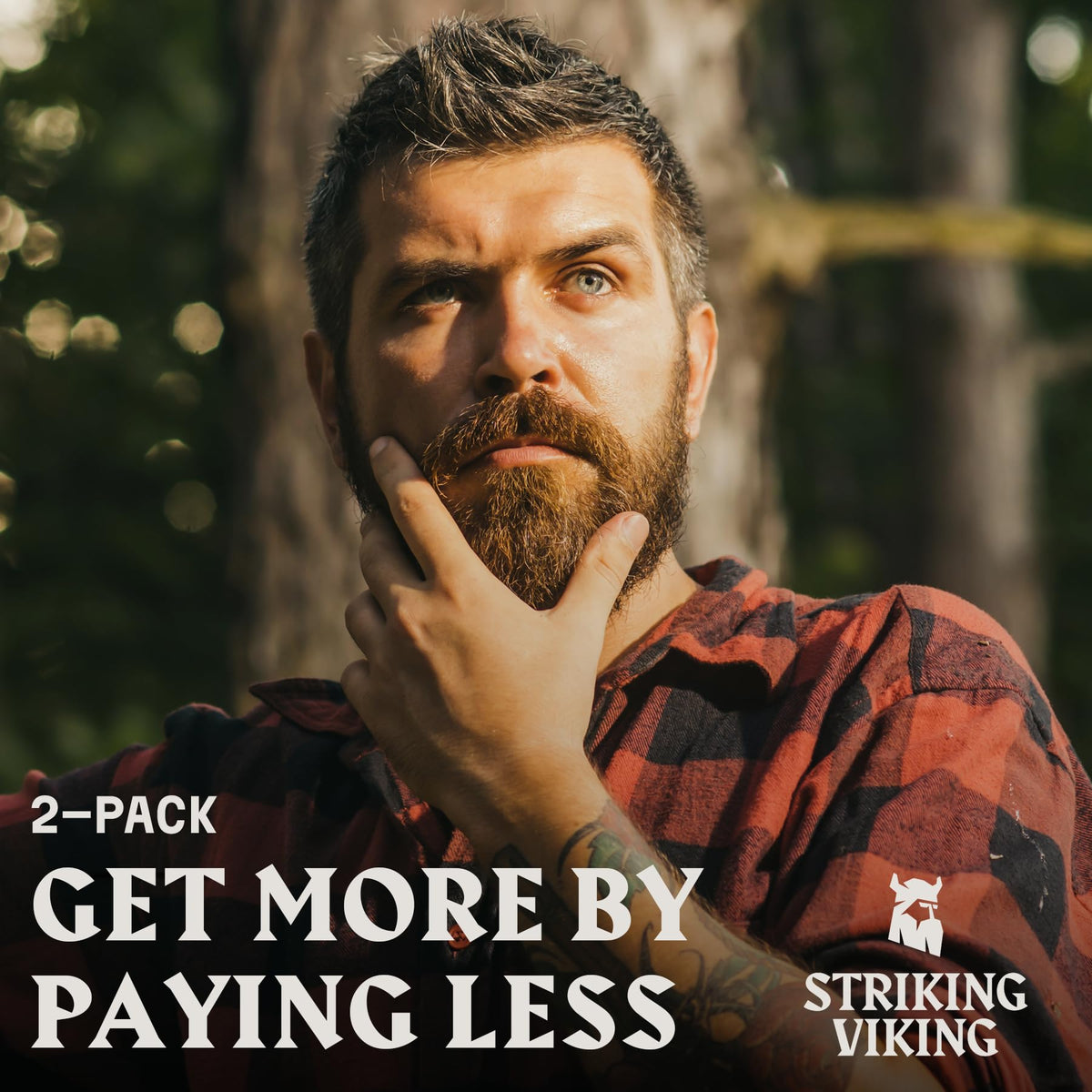 Détail de l'huile à barbe Striking Viking avec goutte d'huile sur une surface