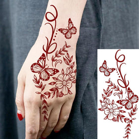 Détail des motifs floraux des tatouages COKTAK