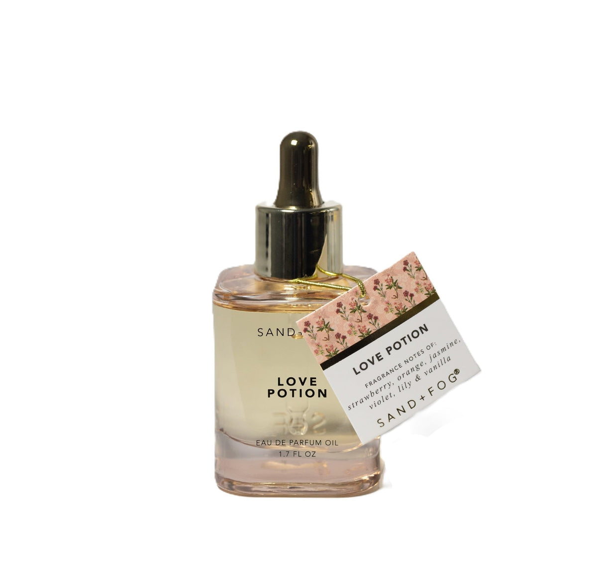 Détail du flacon d'Eau de Parfum Love Potion Sand + Fog avec étiquette élégante