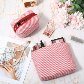 Détail du matériau seersucker des pochettes de maquillage Huhumy
