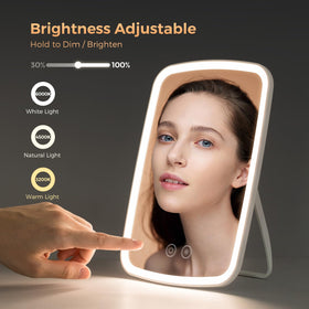 Détail du miroir NEZZOE avec boutons de luminosité et couleurs
