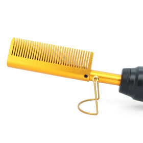 Détail du peigne chauffant Dolahair avec réglage de température