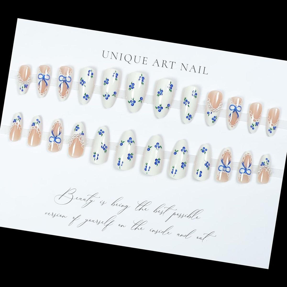 Détails des faux ongles press-on LPOODDNU en bleu avec finition brillante