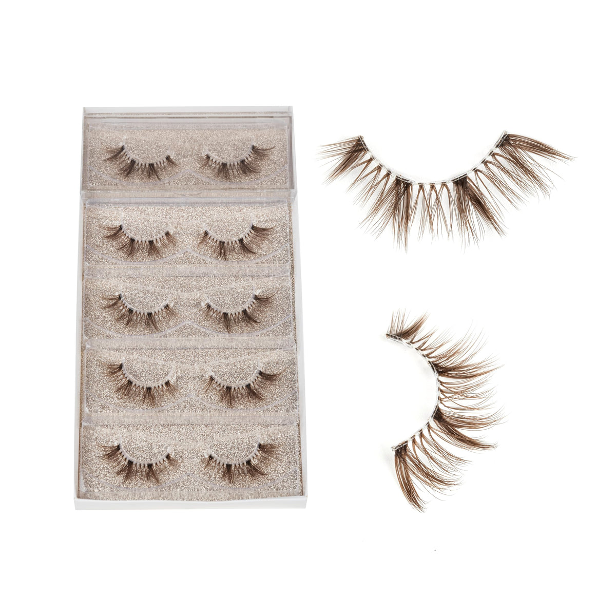 DYSILK Faux Cils Marron-02 8-16mm à côté d'autres accessoires de beauté