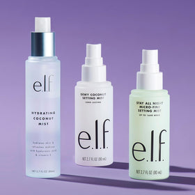 e.l.f. Brume Fixante Dewy à la Noix de Coco 80 ml sur un fond de maquillage