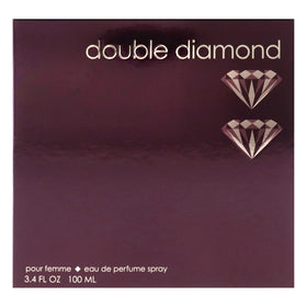 Eau de Parfum Double Diamond 100 ml sur une table