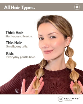 Élastiques à cheveux Heliums avec des cheveux en demi-queue