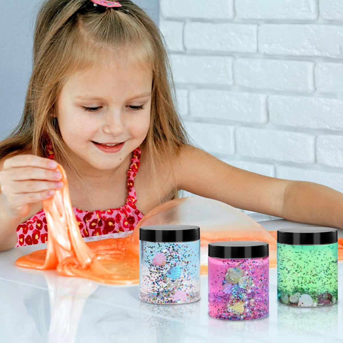 Ensemble de 12 pots plastiques TUZAZO sur fond blanc