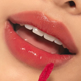 ETUDE Glow Fixing Tint #4 Chilling Red on a model's lips