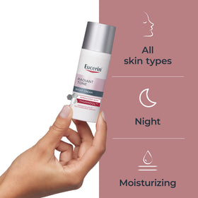 Eucerin Crème de Nuit sur un comptoir avec des fleurs