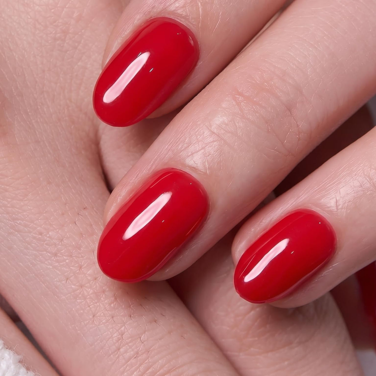 Faux ongles CurvLife press-on oval rouges avec finition en gel souple