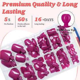 Faux ongles de pied magenta dans leur boîte de rangement