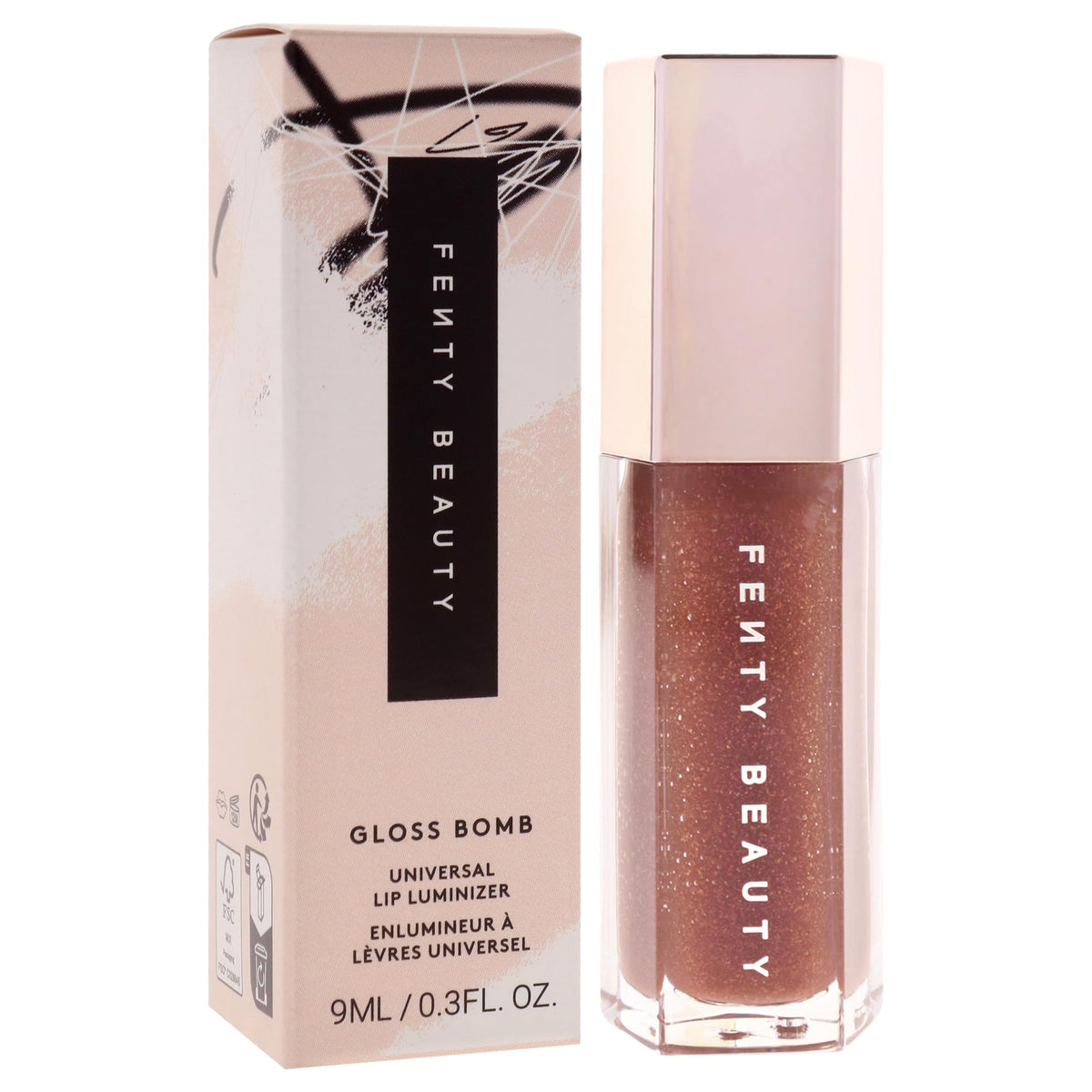 FENTY BEAUTY Gloss Bomb 05 Hot Chocolit sur une surface neutre