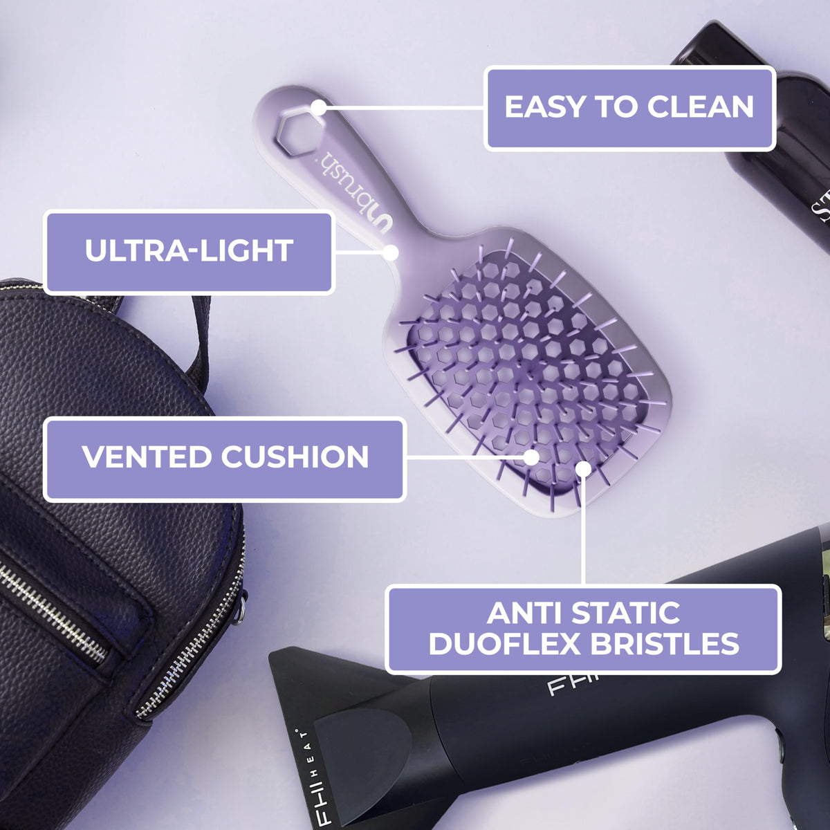 FHI Heat UNbrush Mini Brosse Démêlante en main