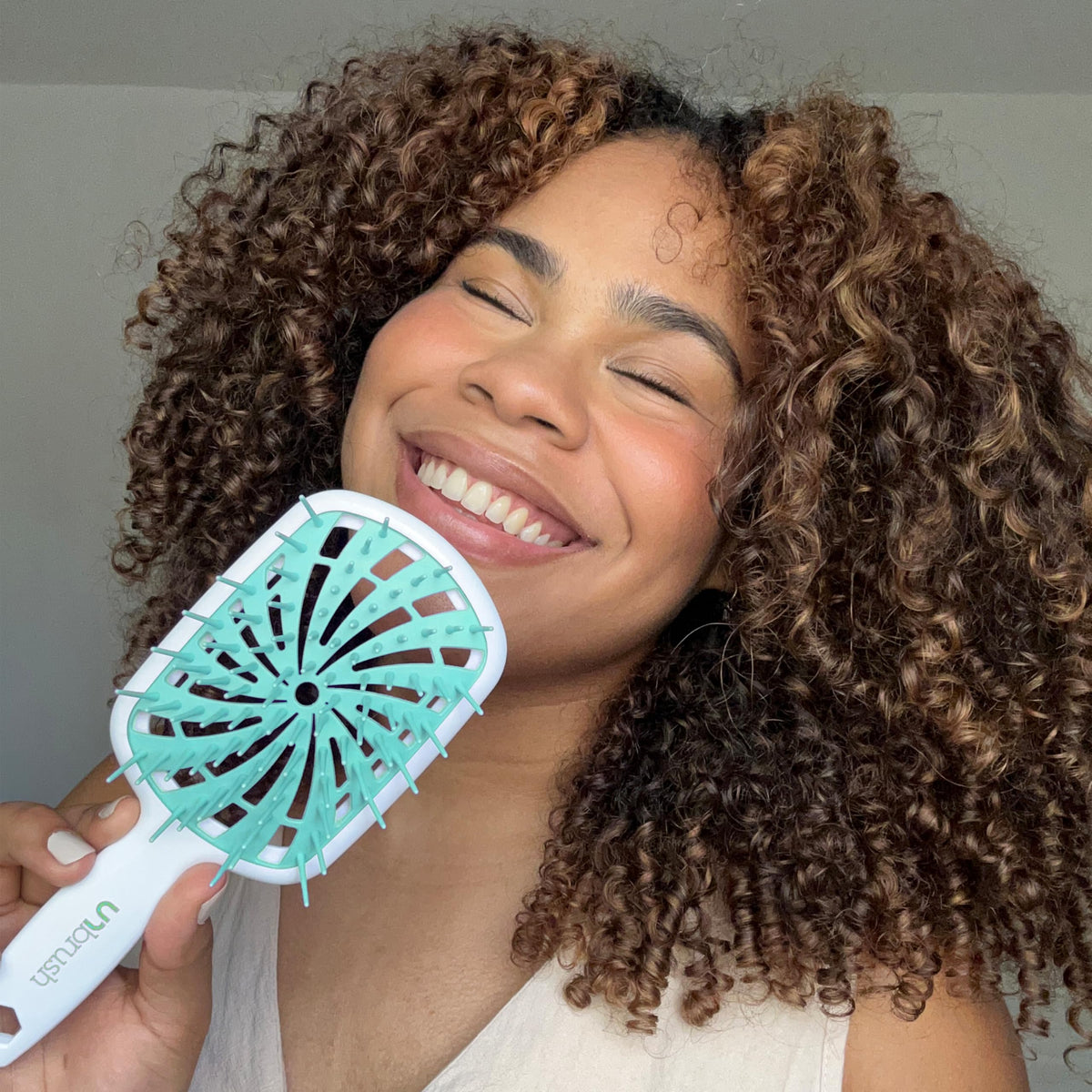 FHI Heat UNbrush Plus brosse démêlante sur cheveux humides