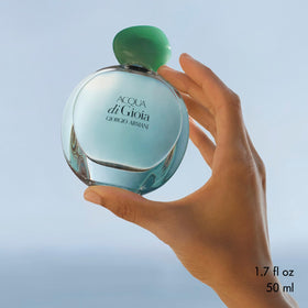 Flacon Acqua di Gioia d'Armani Beauty sur une surface élégante