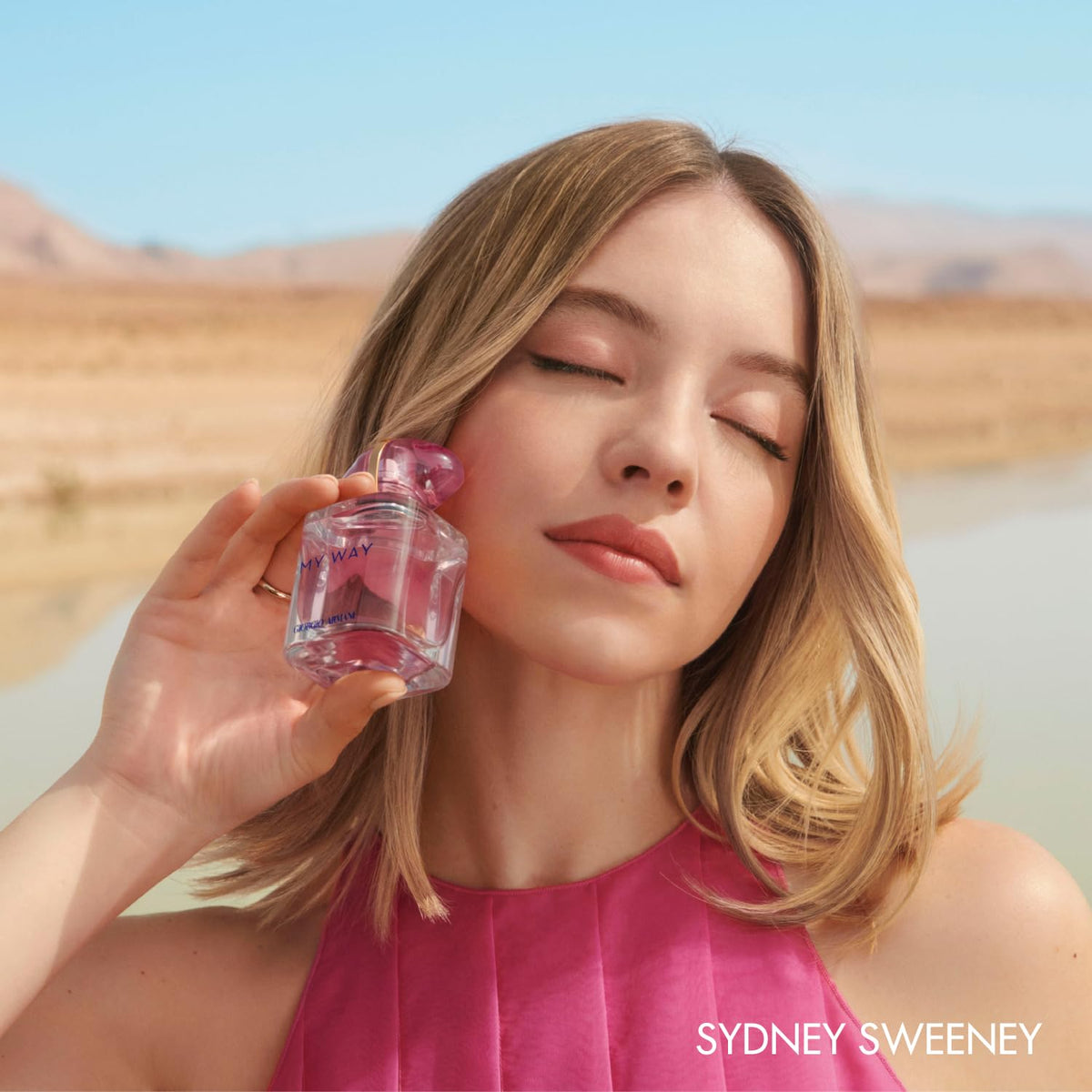 Flacon d'Armani Beauty My Way Nectar avec décorations florales