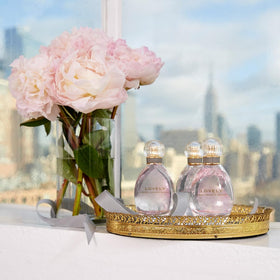 Flacon d'Eau de Parfum Femme Sarah Jessica Parker sur une table