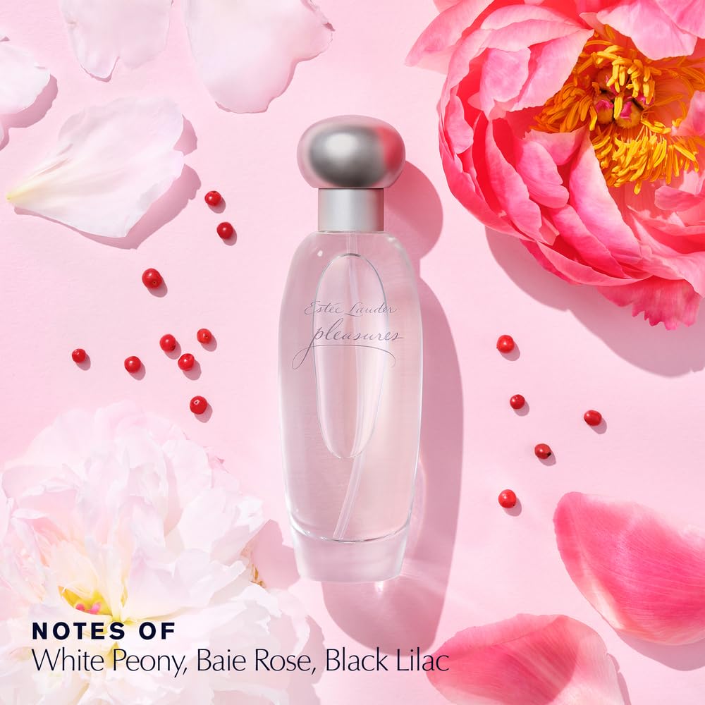 Flacon d'Estée Lauder Pleasures sur une surface élégante