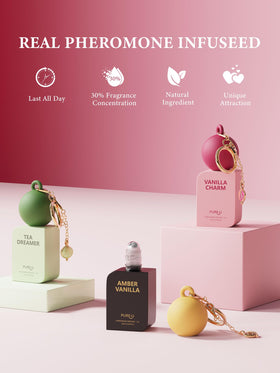 Flacon d'huile de parfum Ambre Vanille à côté d'une rose