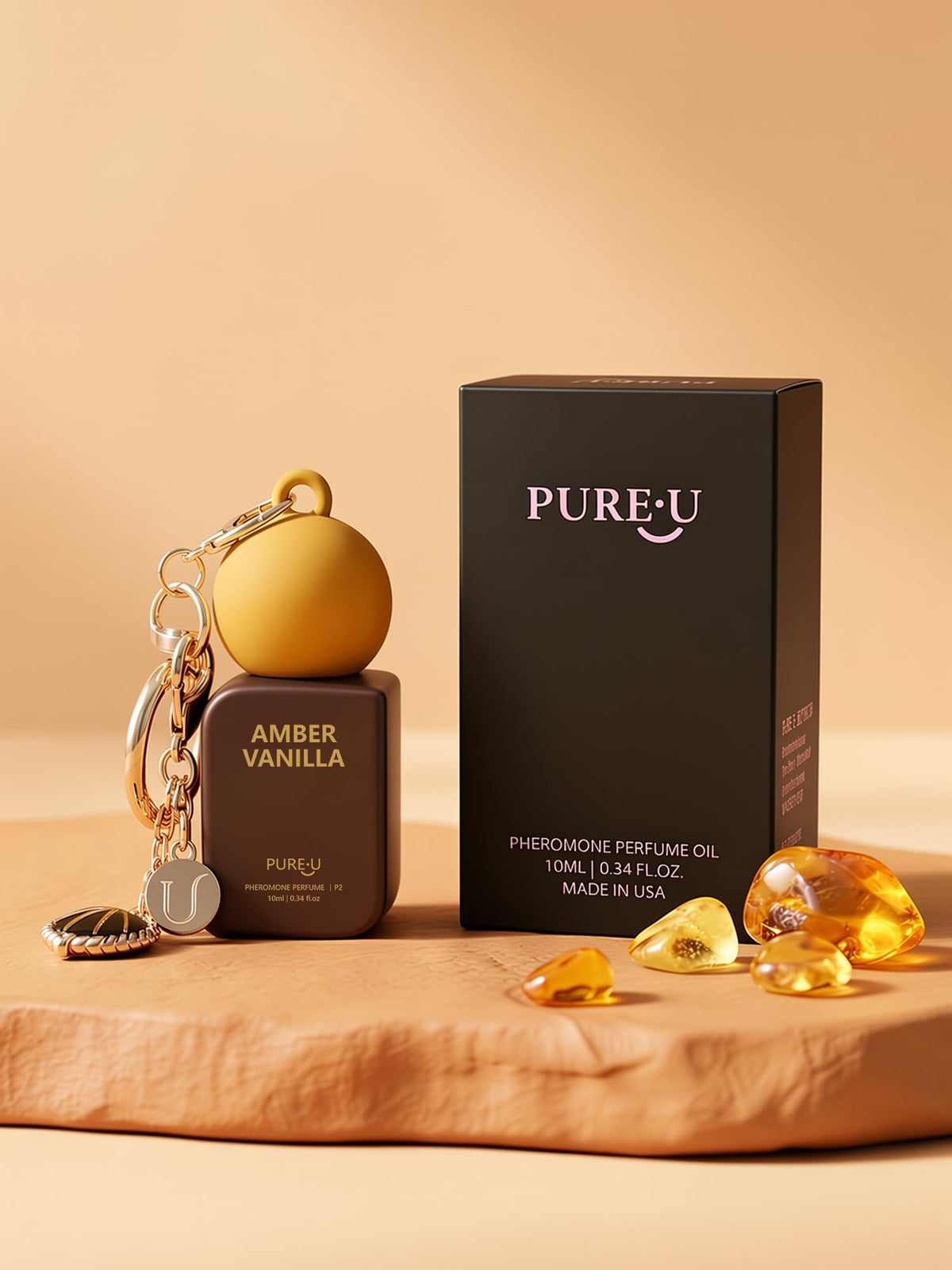 Flacon d'huile de parfum Ambre Vanille entouré de fruits