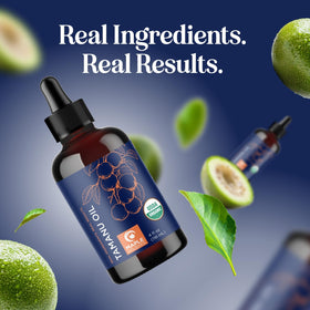 Flacon d'huile de tamanu bio Maple Holistics dans un cadre naturel
