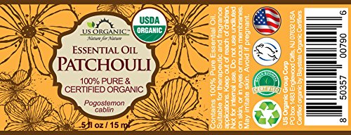 Flacon d'huile essentielle de patchouli avec compte-gouttes