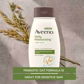 Flacon de gel douche Aveeno 355 ml sur un fond blanc