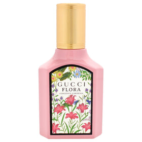Flacon de parfum Gucci Flora Gorgeous Gardenia sur fond blanc