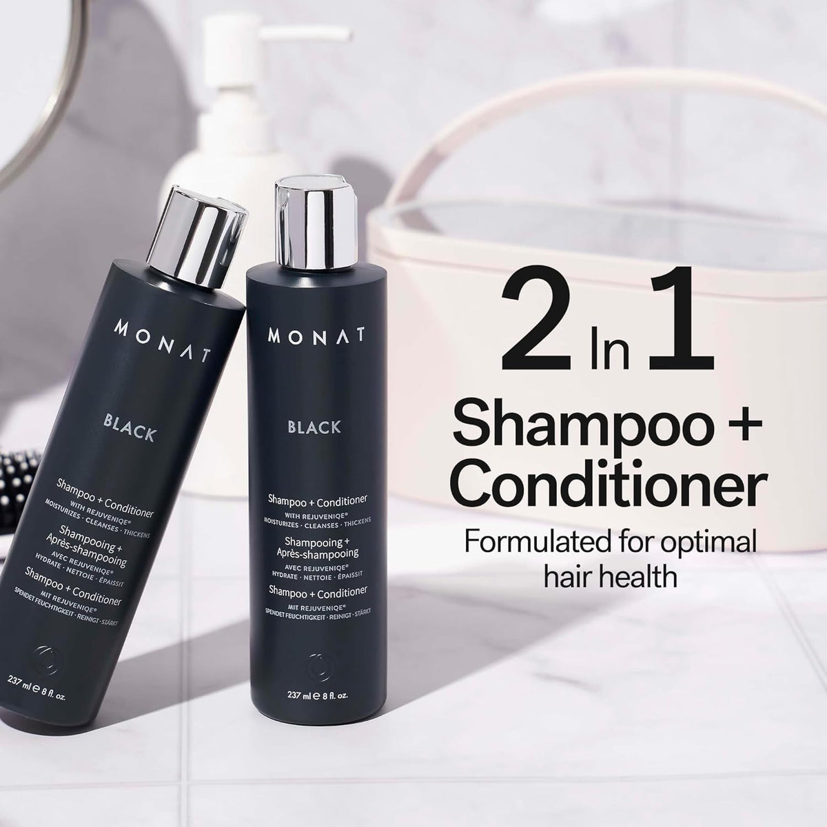 Flacon de Shampooing et Après-shampoing Noir MONAT sur un fond blanc