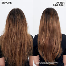 Flacon de shampooing Redken Acide Bonding avec étiquette visible