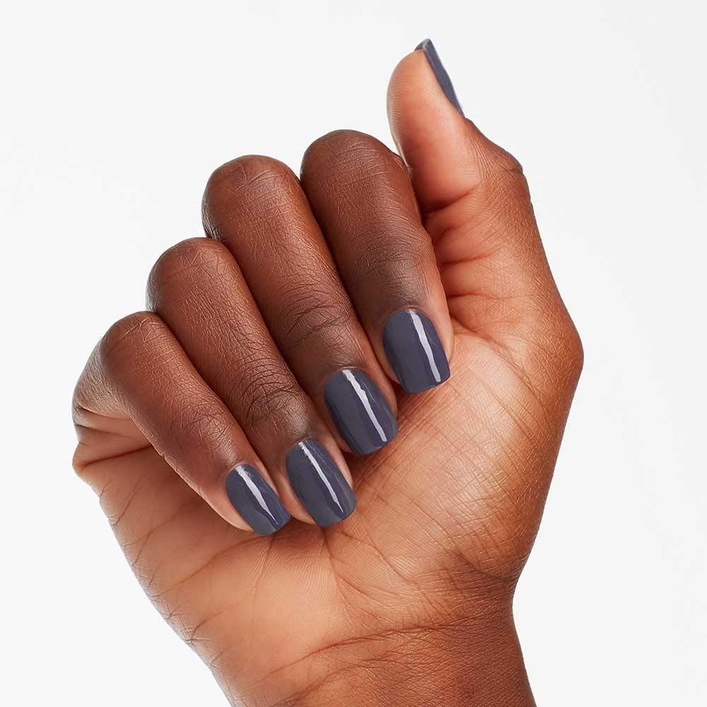 Flacon de vernis OPI Less is Norse sur un fond neutre