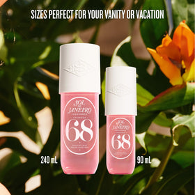 Flacons de parfum Cheirosa 68 avec fleurs en arrière-plan