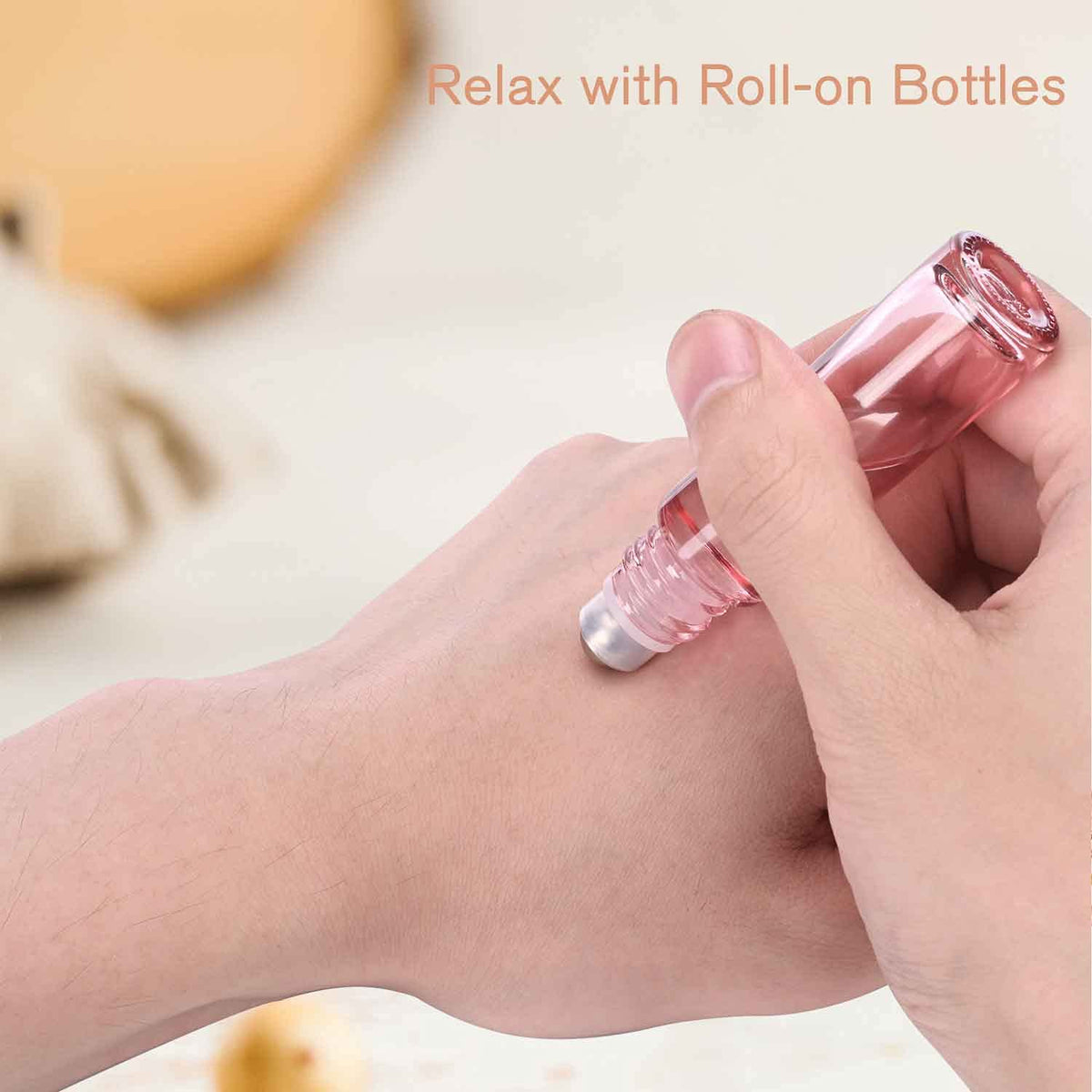 Flacons roll-on rose en verre pour huiles essentielles et parfums
