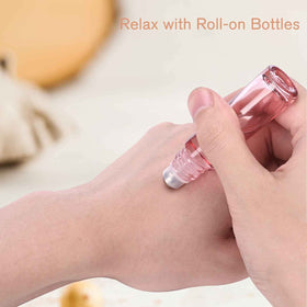 Flacons roll-on rose en verre pour huiles essentielles et parfums