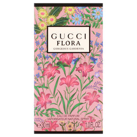 Flora Gorgeous Gardenia de Gucci avec un fond floral