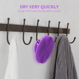Gant de bain BEAUTAIL en utilisation sur le corps