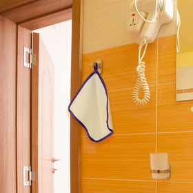 Gant de bain Tatuo suspendu pour sécher rapidement