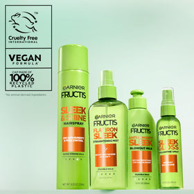Garnier Fructis Spray Fixant affiché sur une coiffeuse