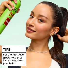 Garnier Fructis Spray Fixant sur fond coloré