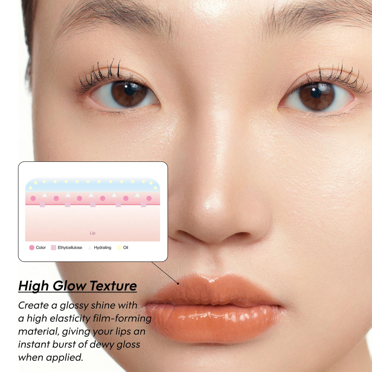 Glossy Lip Tint Opal Charm sur une table avec accessoires de maquillage