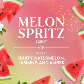 Gouttes de gel douche Olay Melon Spritz sur une surface