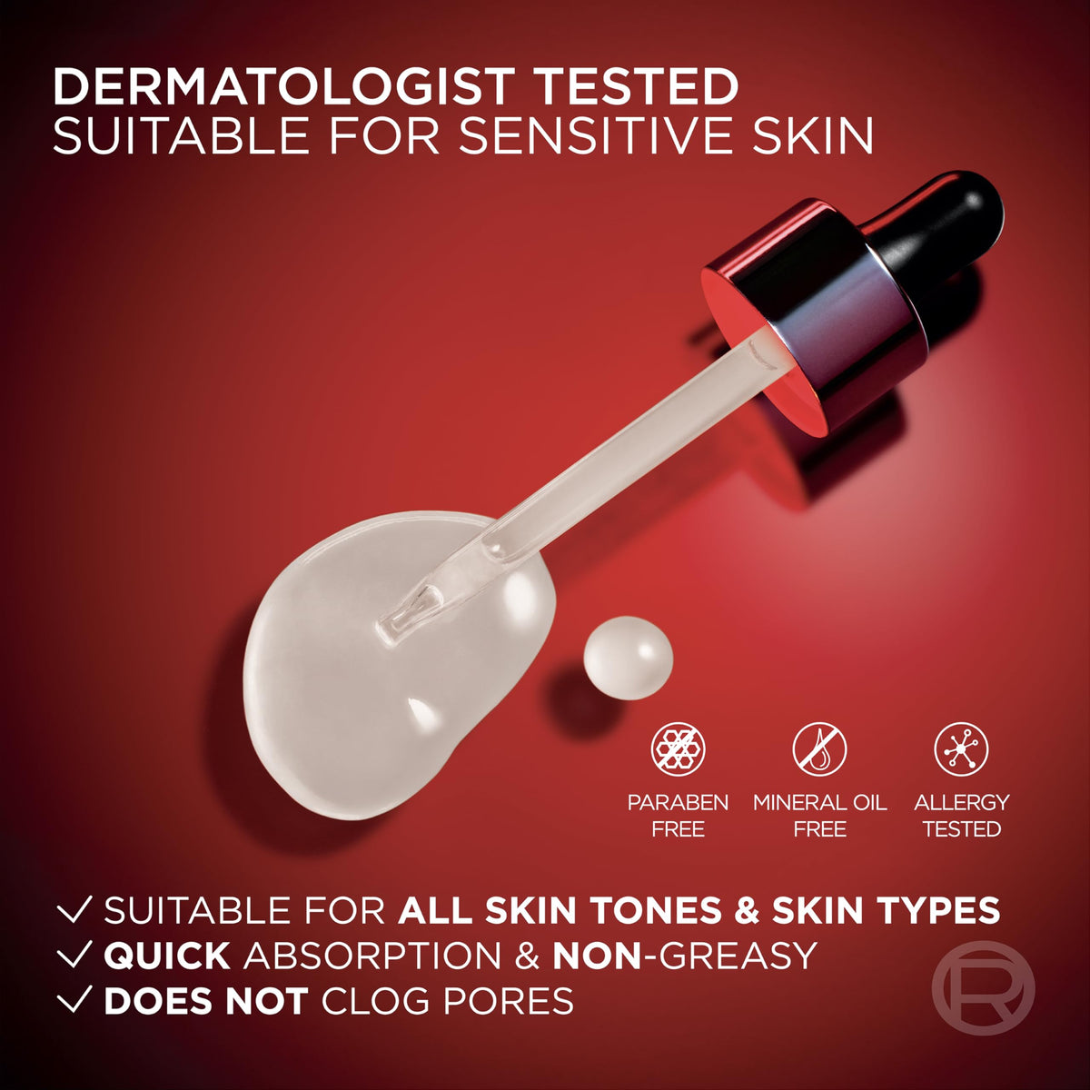 Gouttes de sérum L'Oreal Paris sur un fond blanc