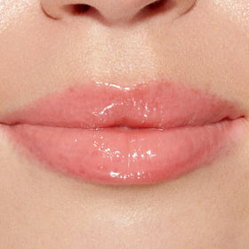 Gros plan sur l'applicateur du gloss Too Faced